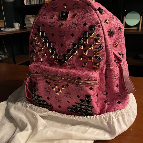 medium size pink mcm backpack